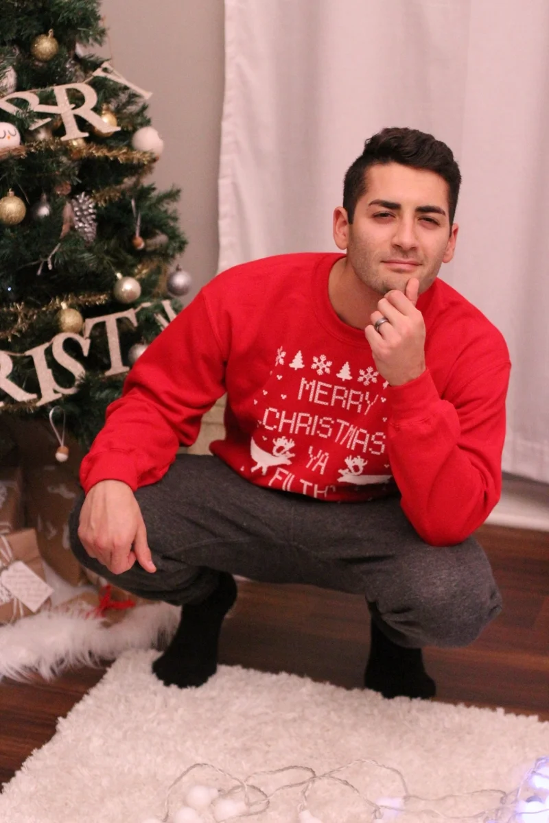 He's such a stud muffin in his Christmas sweater