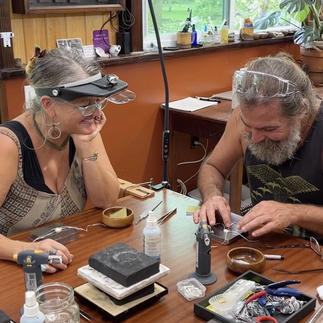 Couples, families, and friends creating jewelry together during a class near Hilo on the Big Island of Hawaii