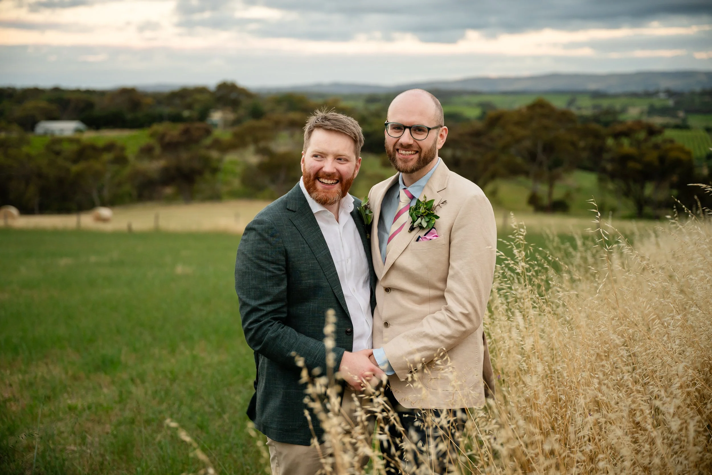 Two grooms celebrating their wedding at Simon Hackett Wines