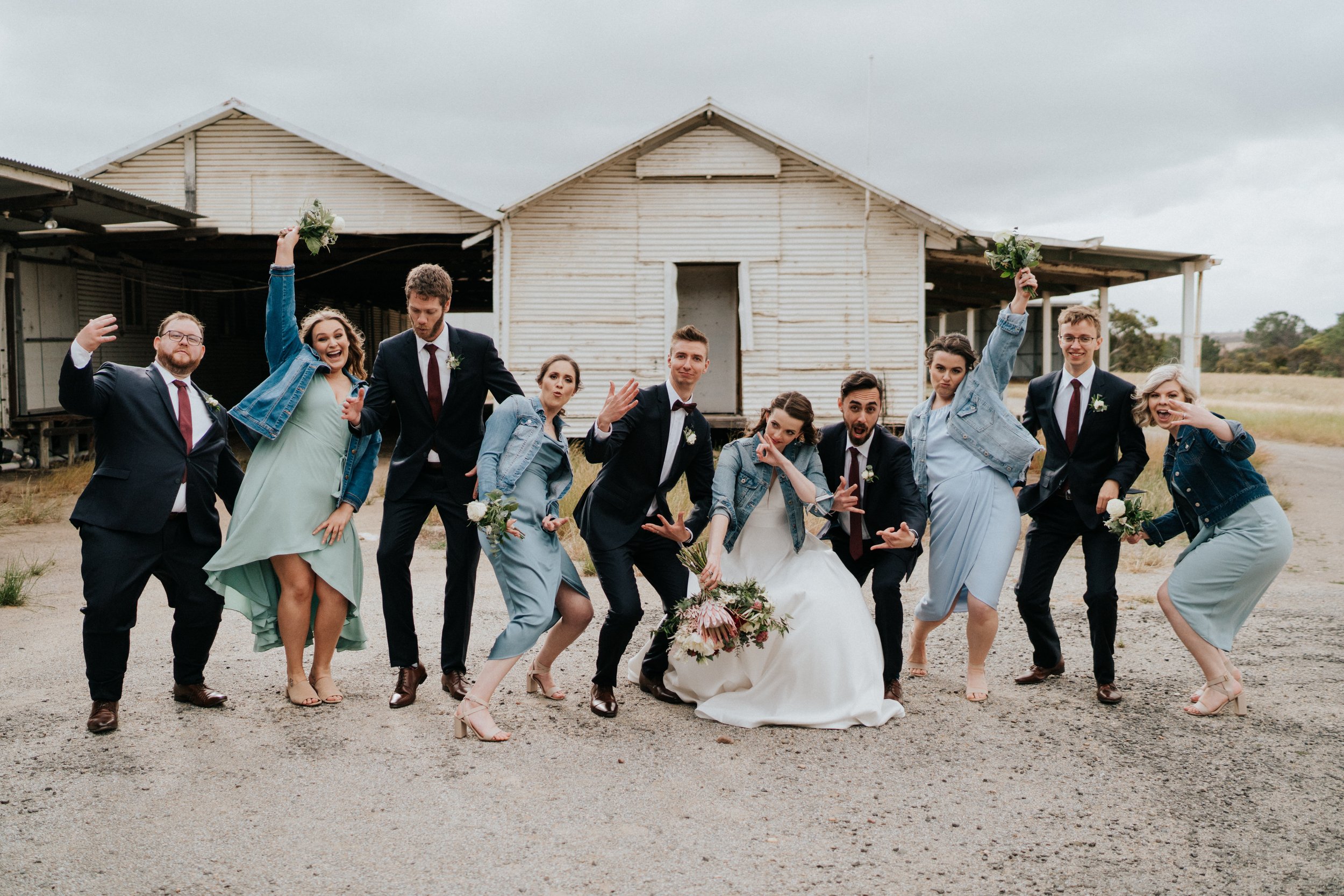 Wedding party celebrating together after the ceremony at a joyful event created through wedding planning Adelaide expertise