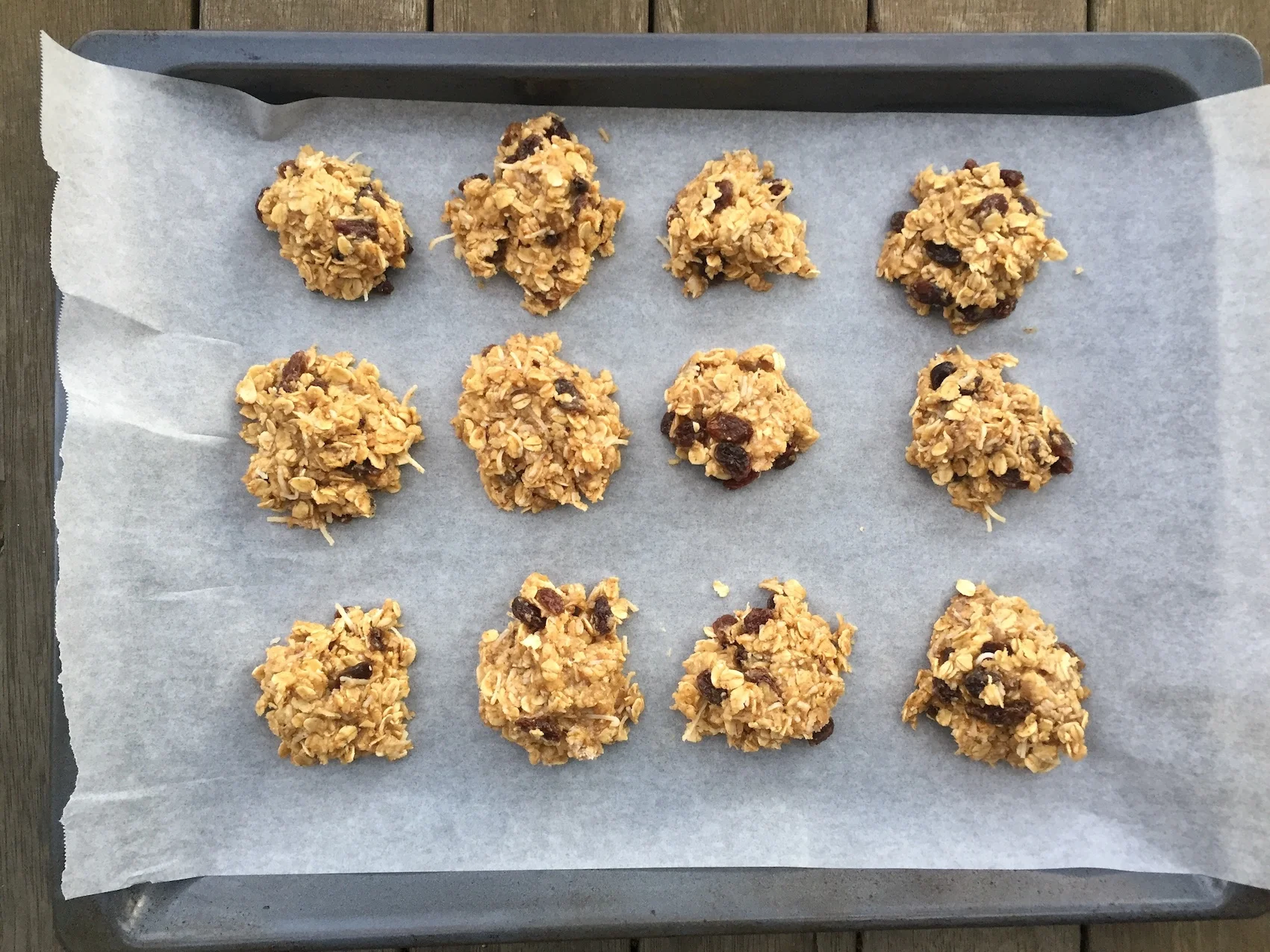 The muesli cookies on the tray before going into the oven