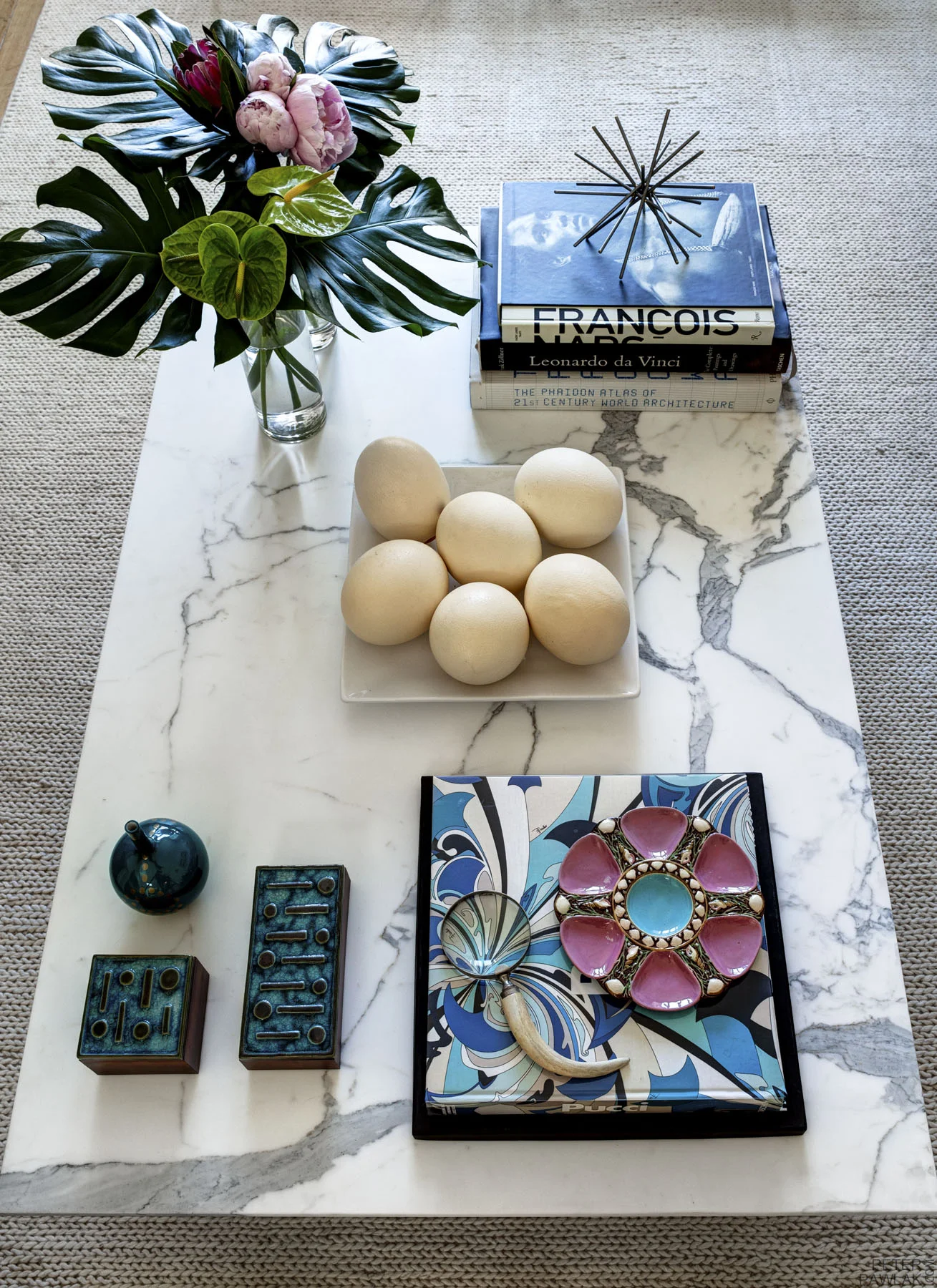  Luxury tabletop still life arrange on a custom designed Italian marble coffee table.   Bruce Buck photographer  