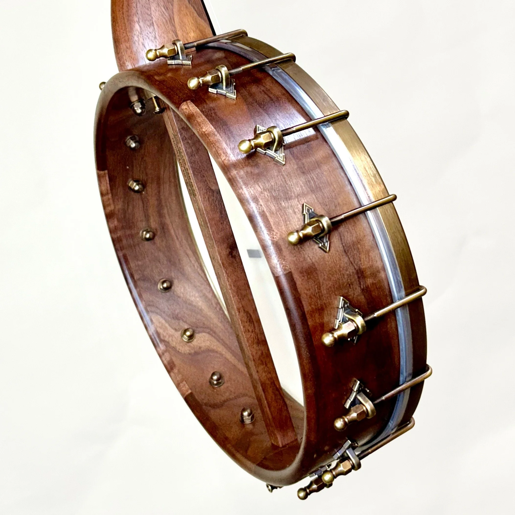 Figured Walnut and Exotic Figured Ebony with Rolled Brass tone ring