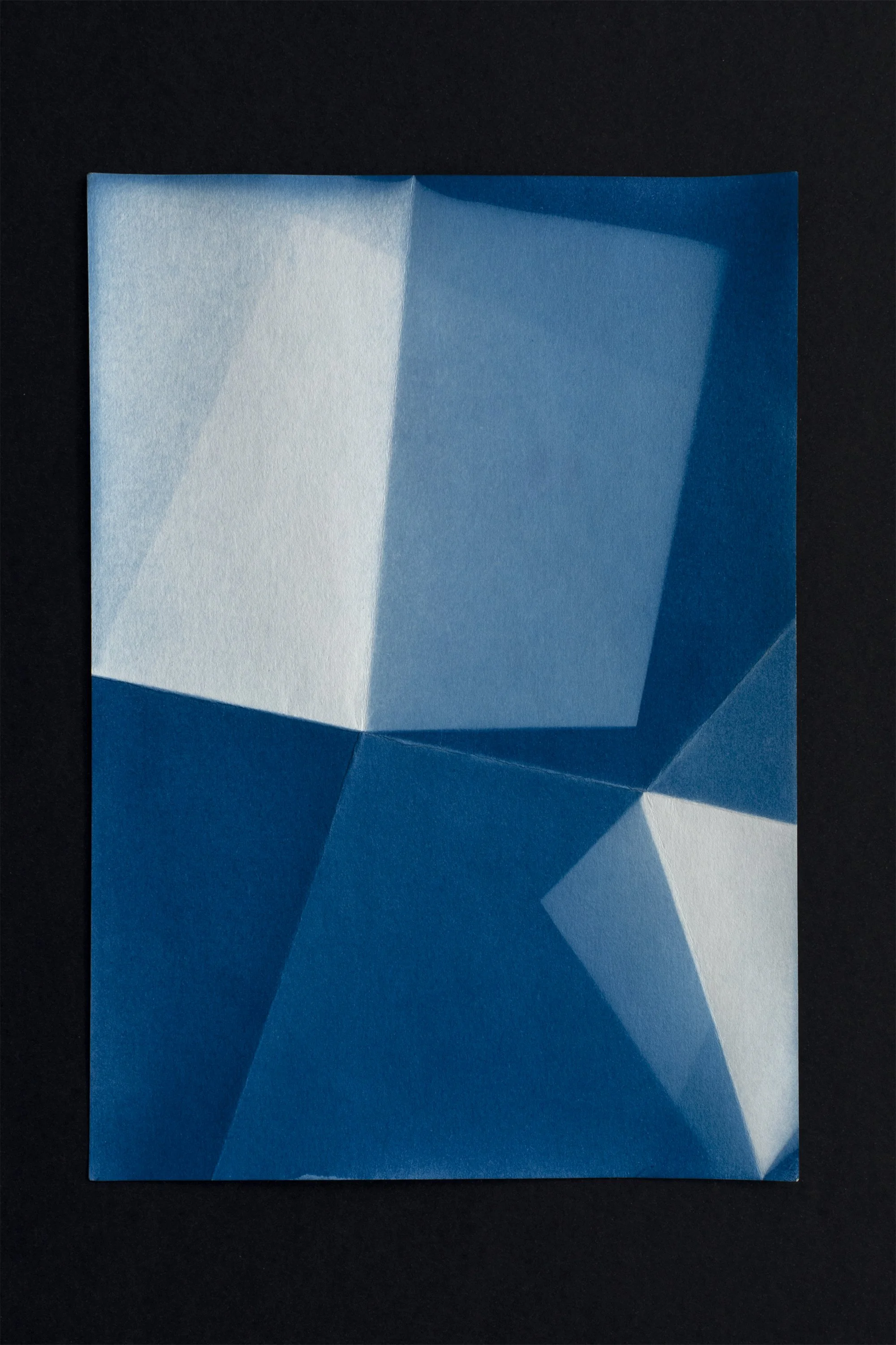  cyanotype on paper, folds, sunlight 