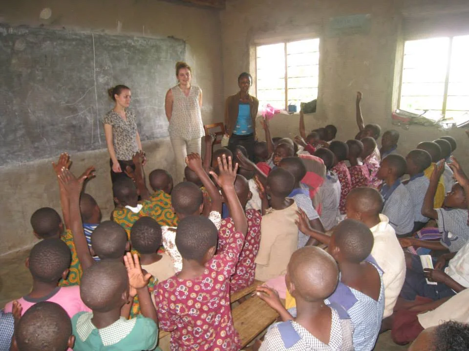 Medical volunteers from the UK give health education talk to school next to rural clinic (photo credit Lisa Umphrey, 2013)