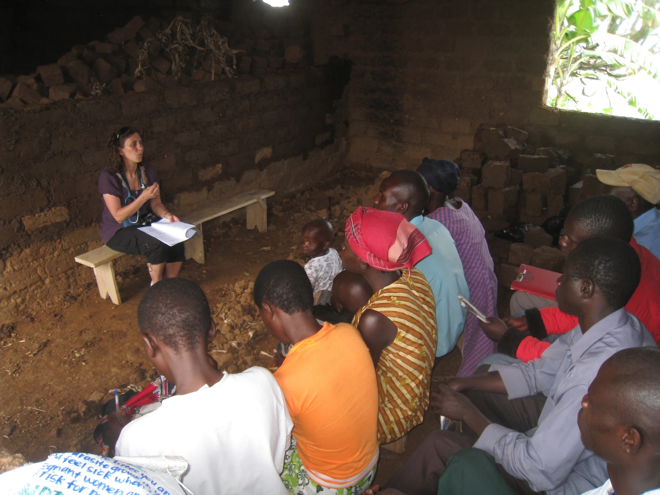 Dr. Traci Downs, SUNY, teaching VHT members from health curricula, Manafwa, 2013 (photo credit Lisa Umphrey)
