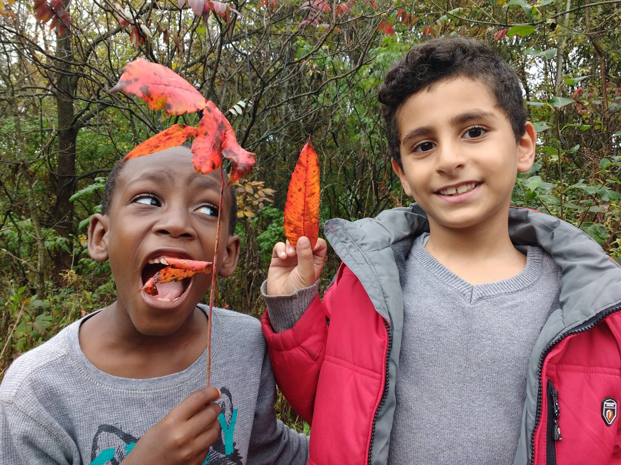 Two youngsters goof off in the woods. Madison Audubon photo