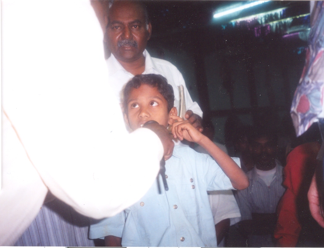 This young boy was deaf in one ear but was healed in a crusade in India.