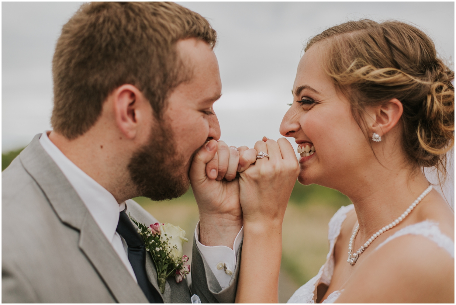 bride and groom pinky promise