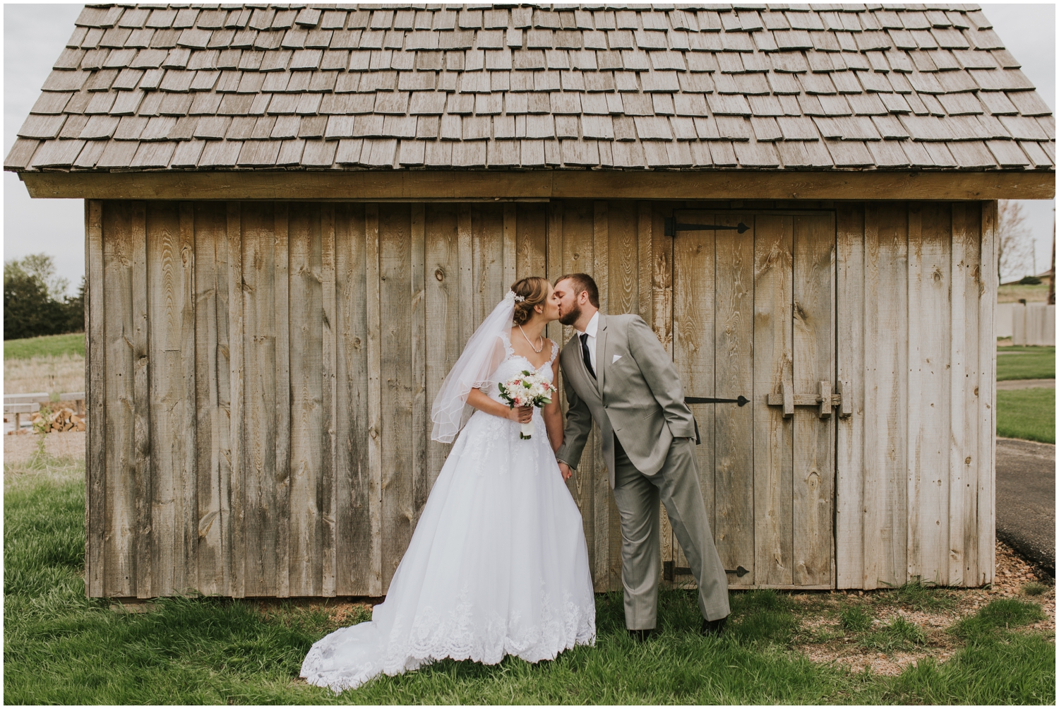 bride and groom kiss