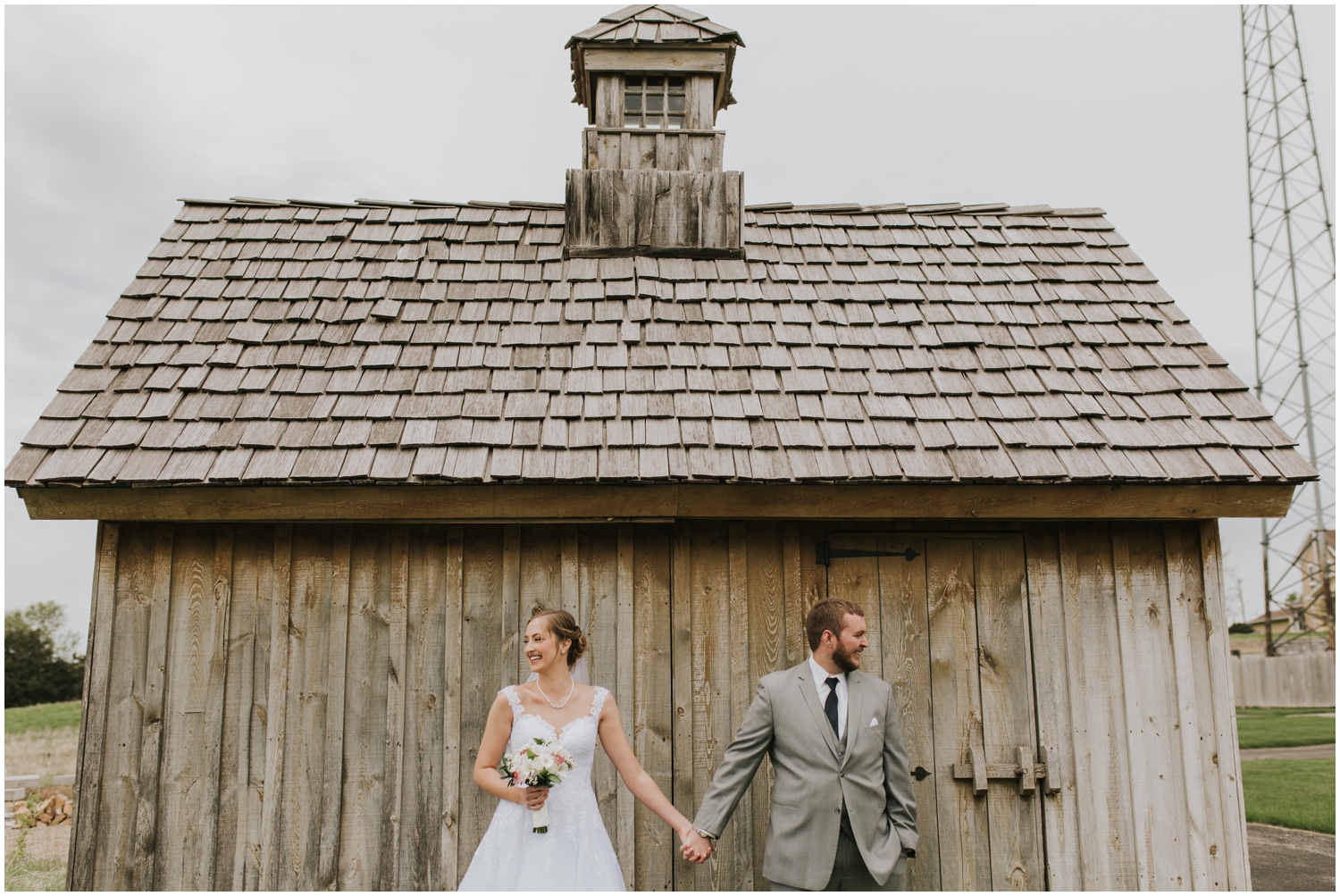 bride and groom holding hands