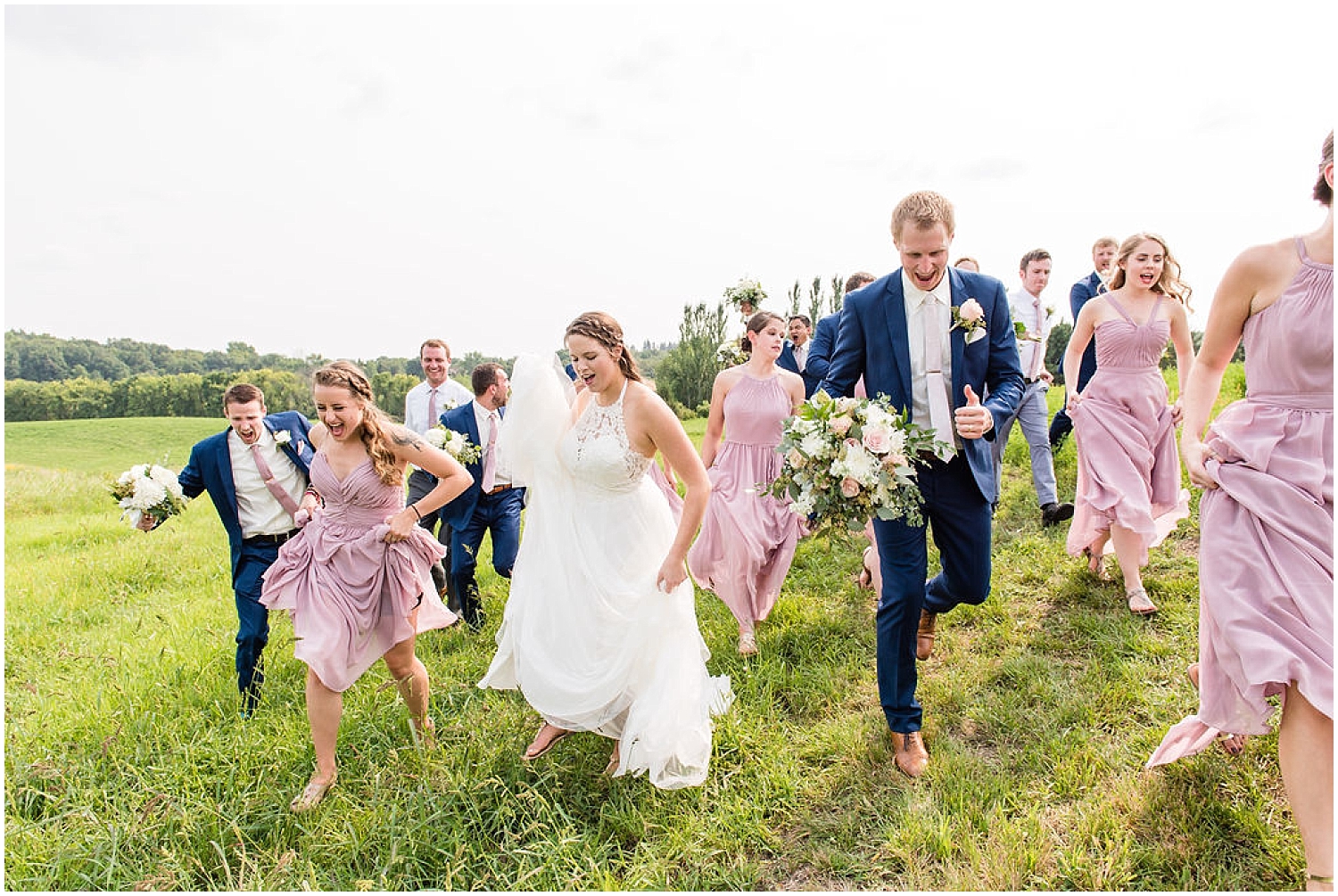 bridal party with the bride and groom
