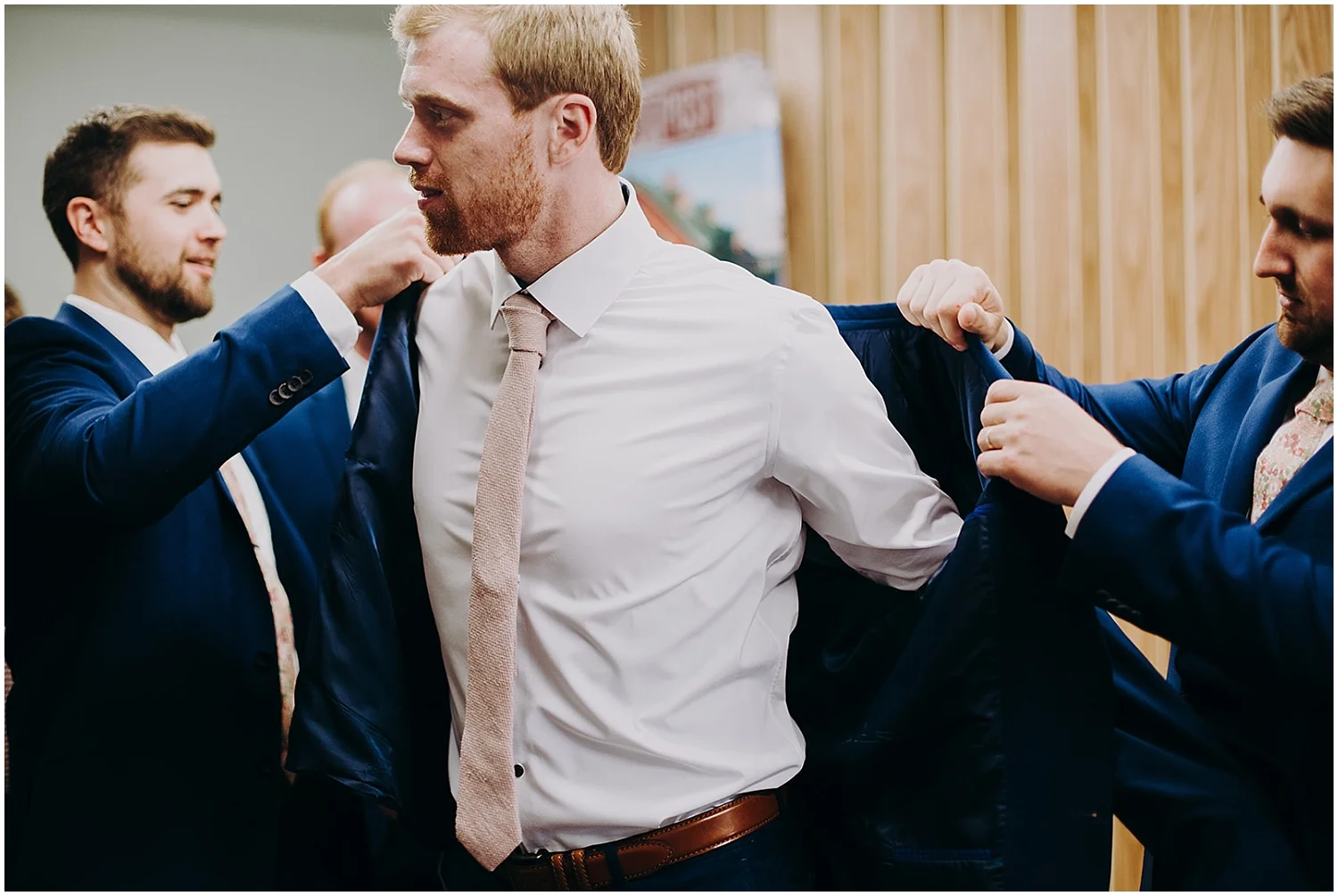 groom getting ready for his wedding in Minnesota