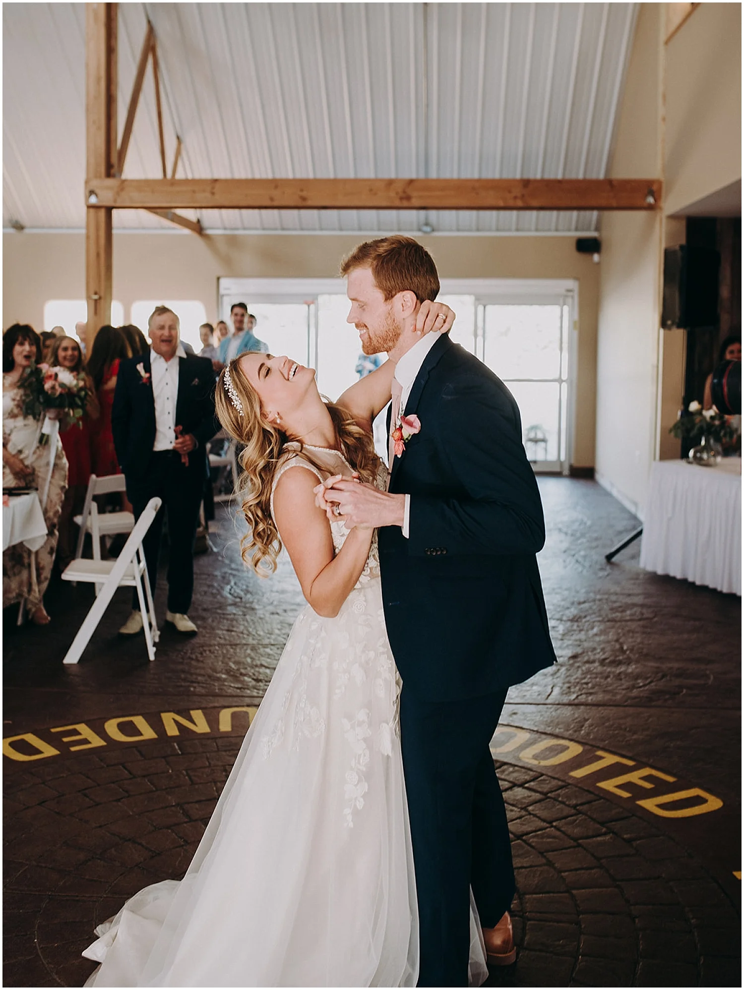 bride and groom having their first dance