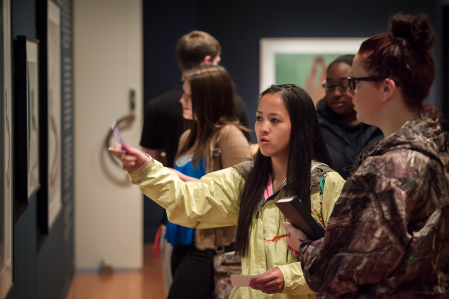 A student in Summerbridge Academy analyses a work of art with a partner.