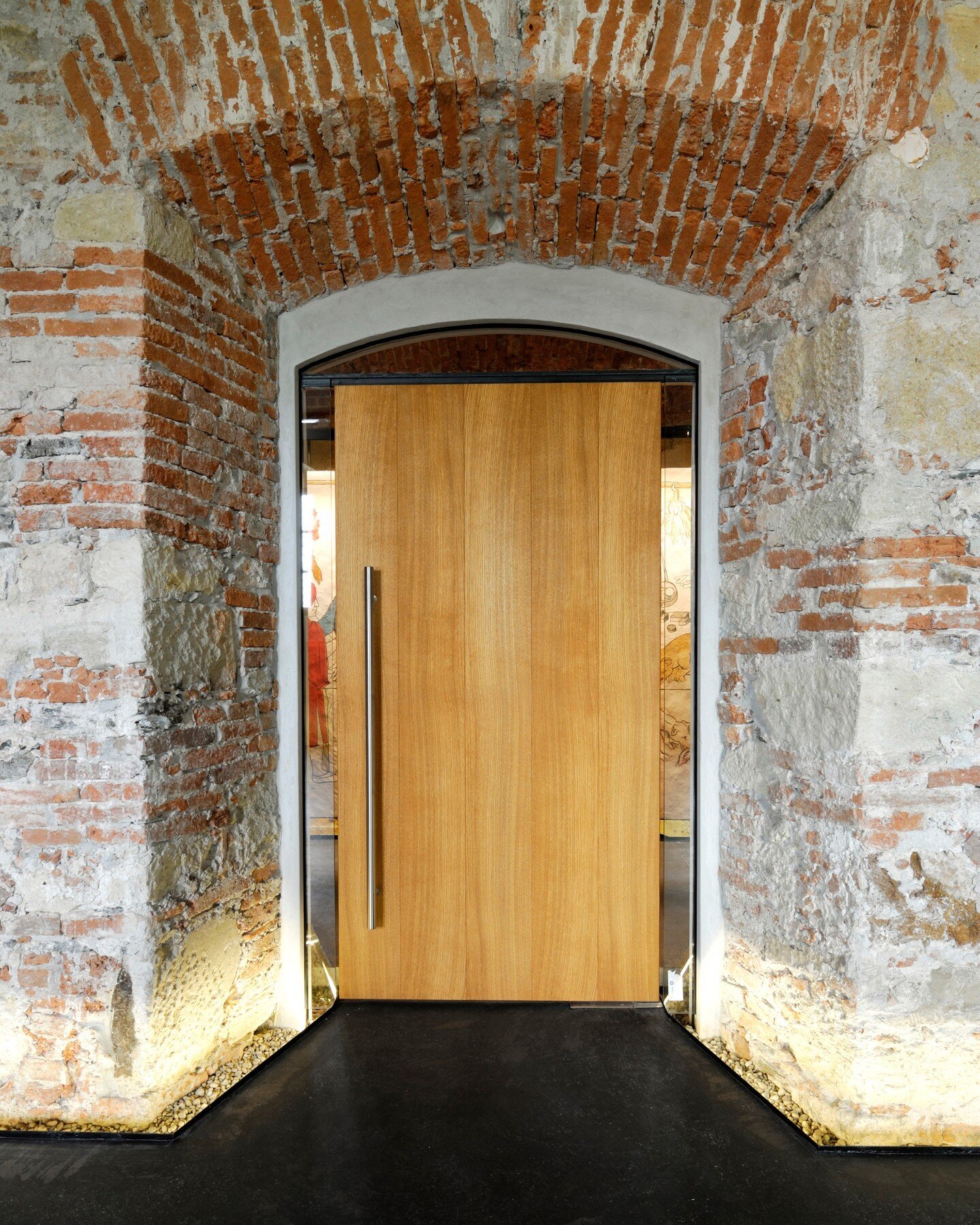 The most compelling architectural dialogue arises when the old and the new meet in unison. / Ko se srečata staro in novo, nastanejo najbolj zanimivi arhitekturni dialogi. 
...
#architecture #renovation #publicbuilding #celje #design #door #wood #ston