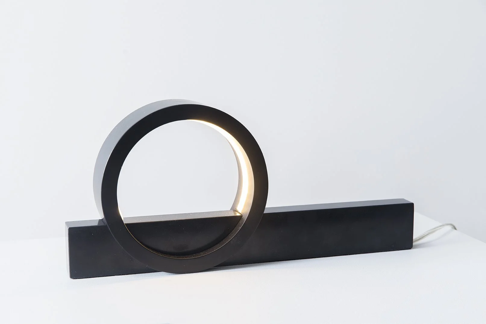 Black Composition Light table lamp with illuminated circular form