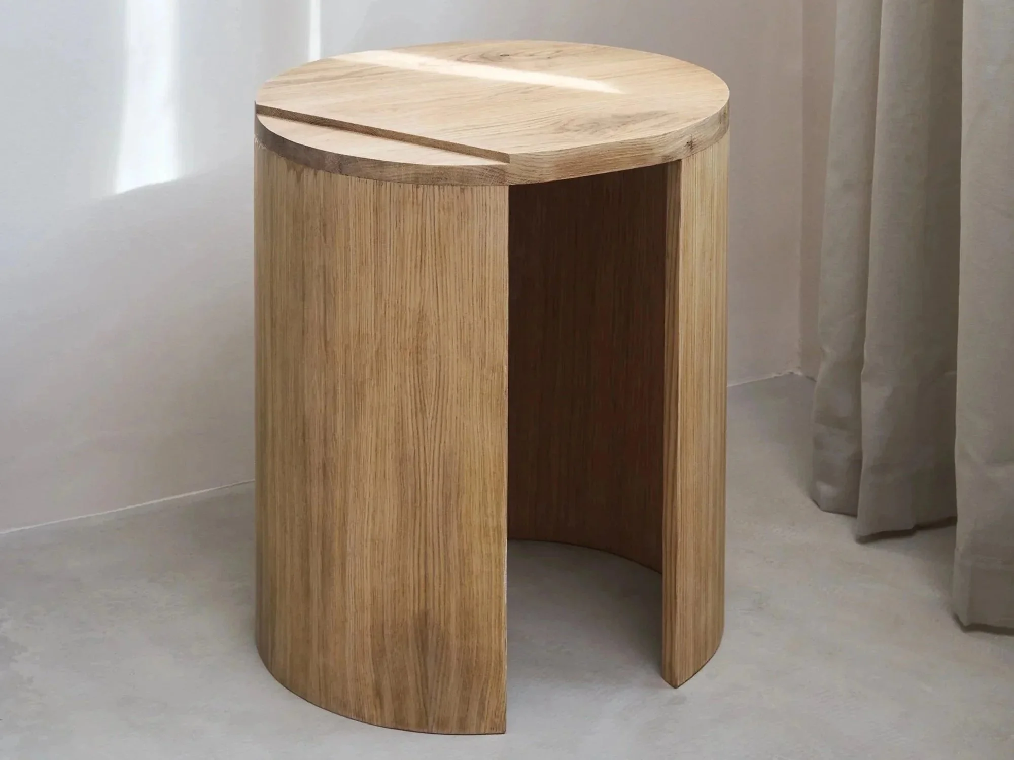 Oak stool in minimal interior 