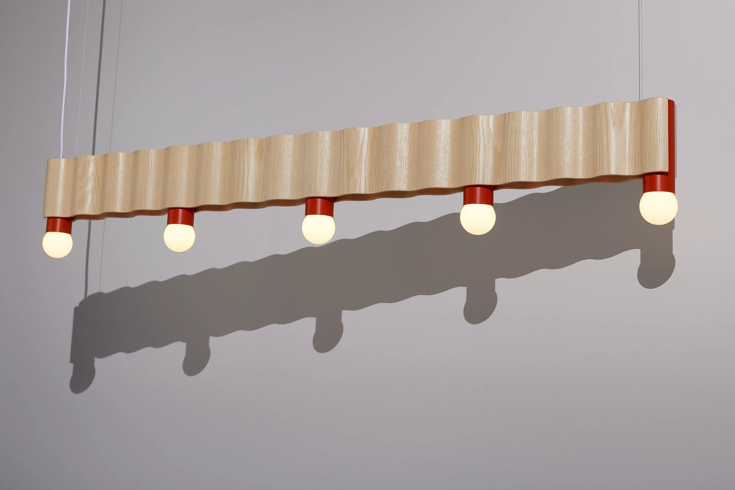 Linear Corrugation pendant light in ash veneer with multiple bulbs