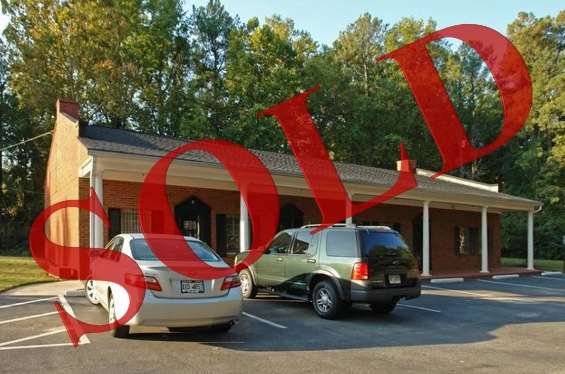 Front view of the subject property on Candler Parkway