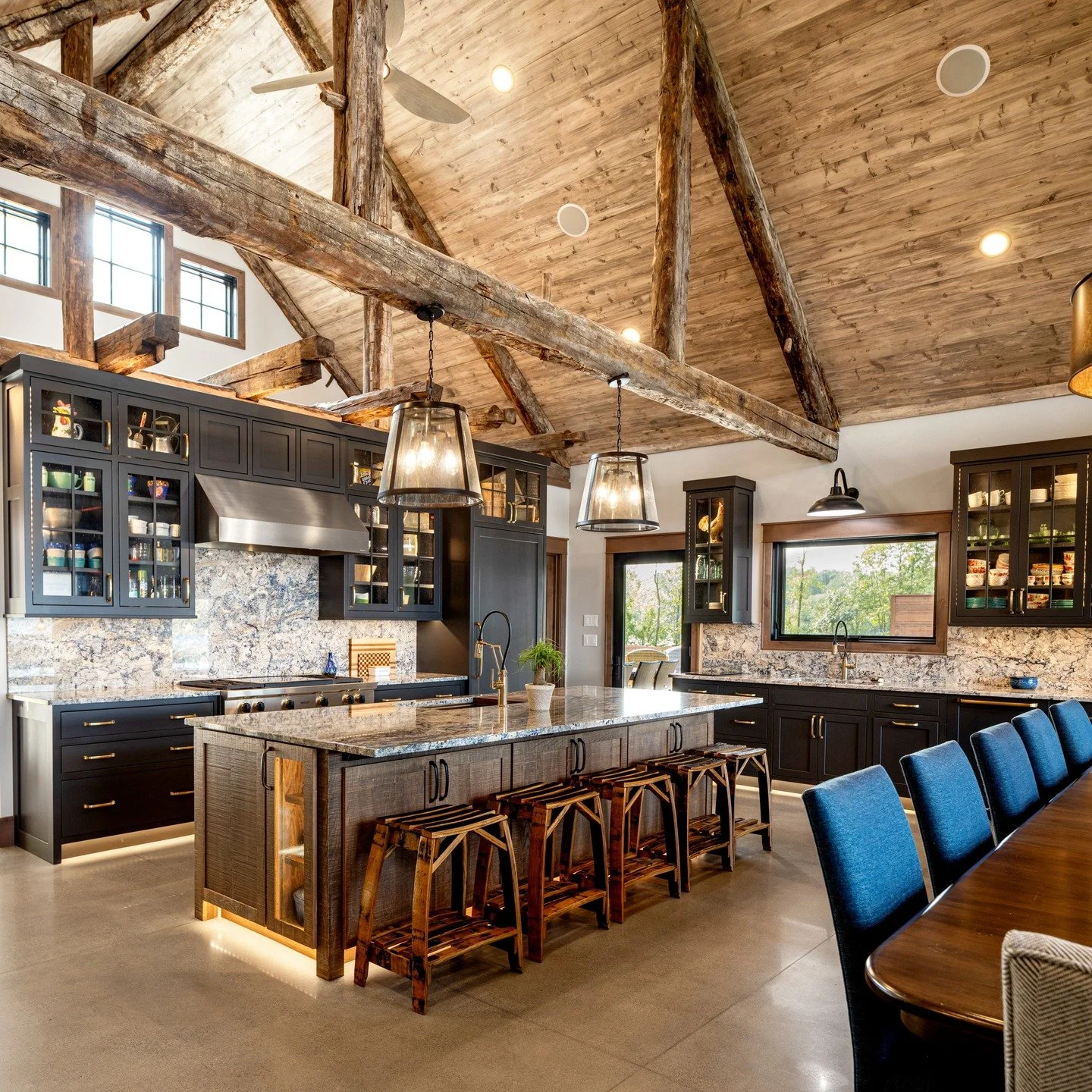 A custom modern lodge-style kitchen thoughtfully designed with abundant storage solutions and layered design elements to create a space that feels warm, functional, and entirely one of a kind.

Contracted &amp; Designed by: @lighthouse_construction_ 