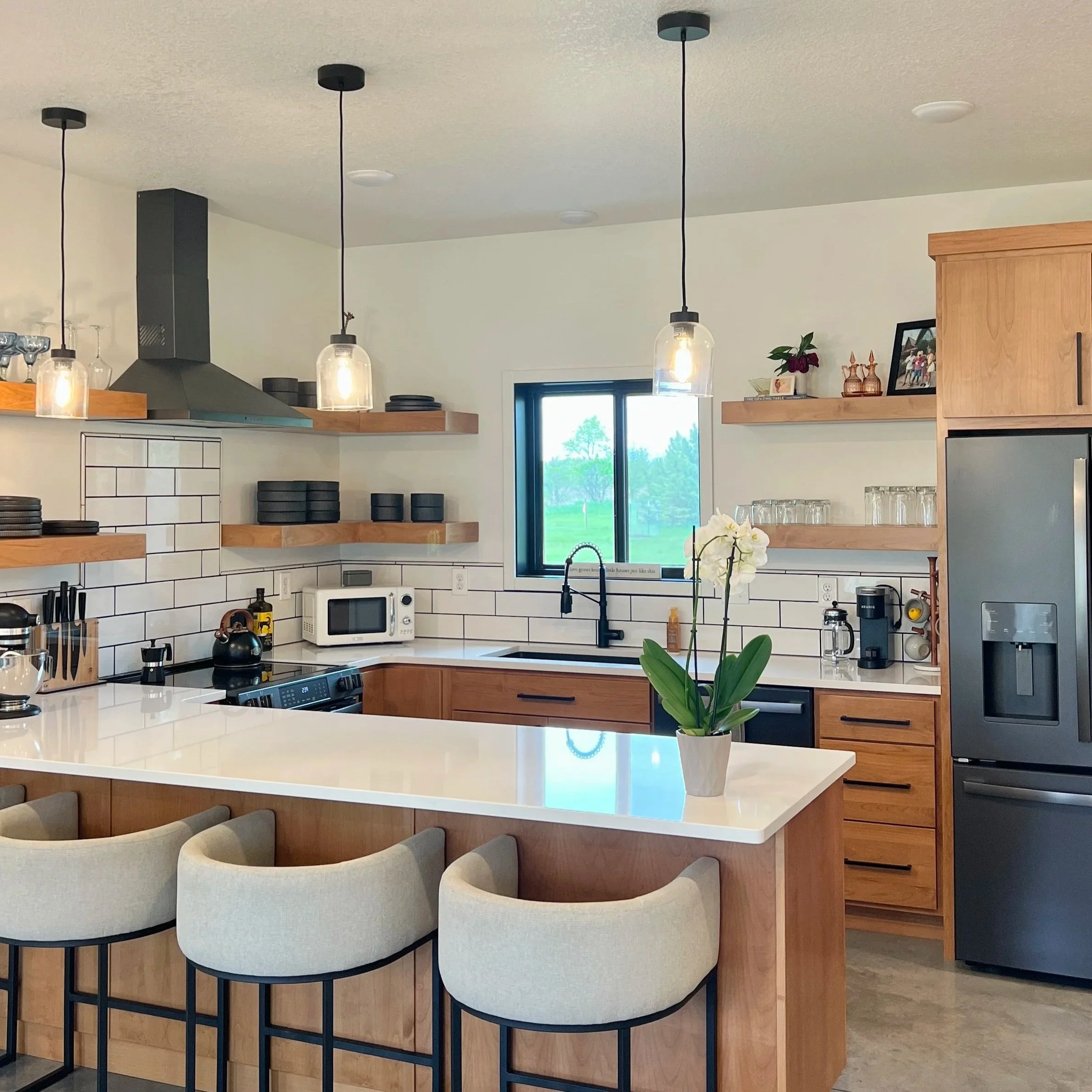 Warm Contemporary Kitchen Remodel by Eischens Wood Products Inc. project photo