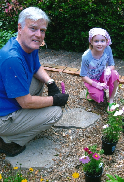 GrandDad and Katie gardening