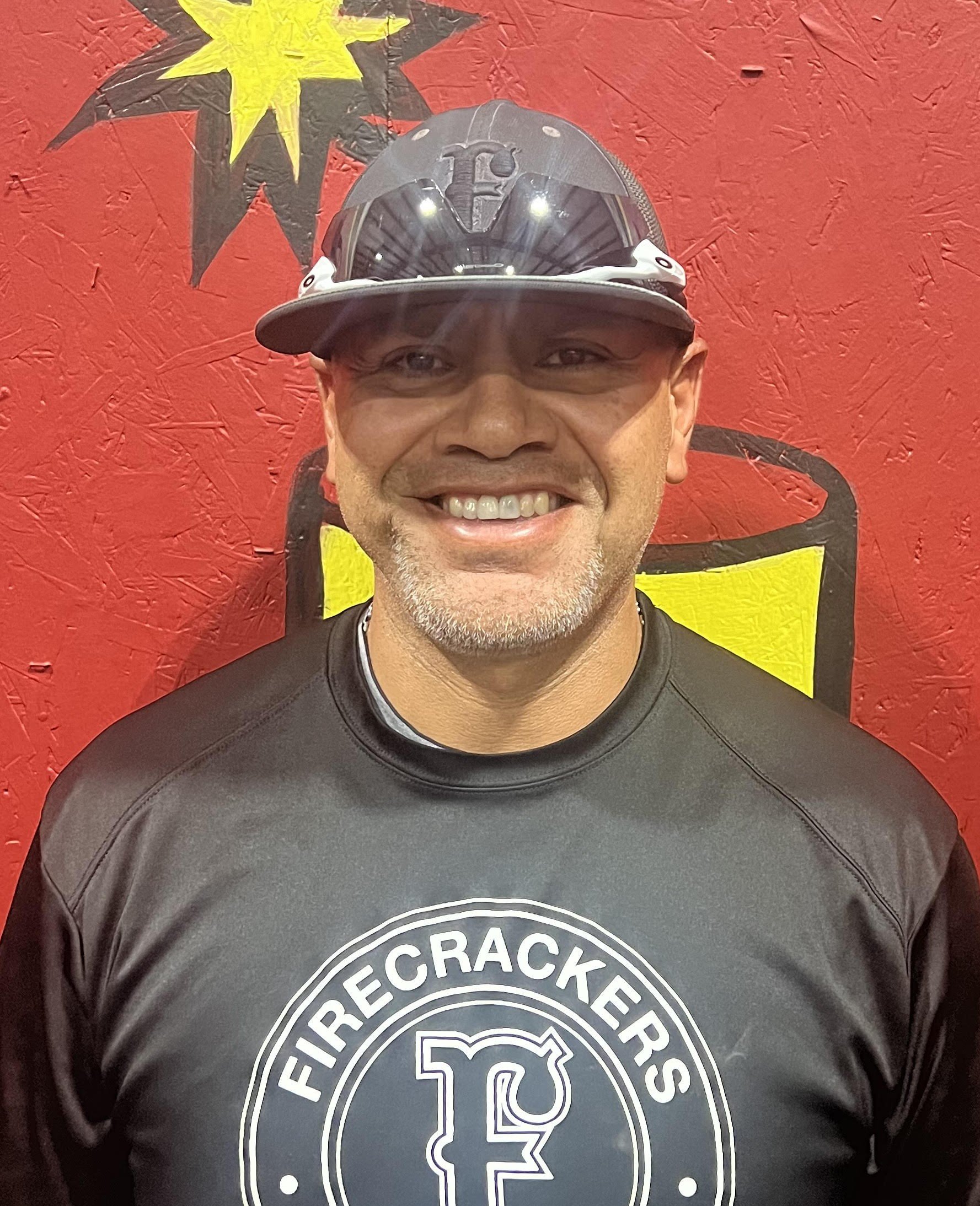 Associate Head Coach Ozzie Muniz