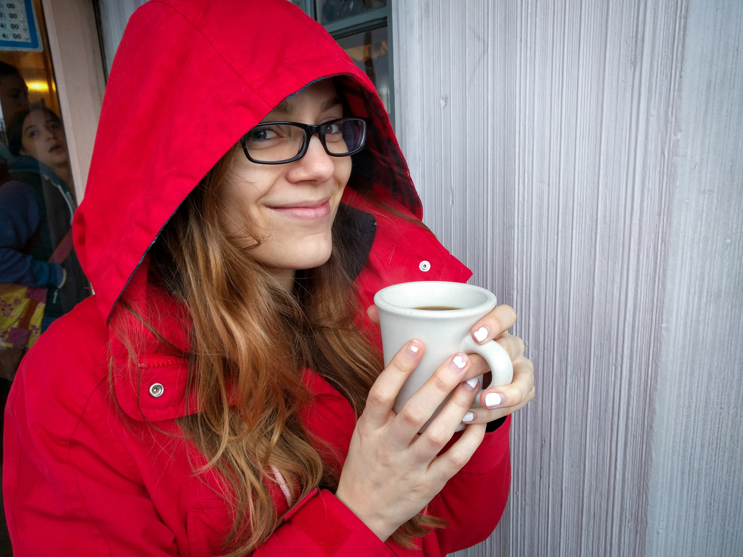 We made it! This is at the most excellent Glo's diner. There's not enough room to wait inside, but they give you piping hot coffee to keep you warm outside! Also, ignore the girl in the background...