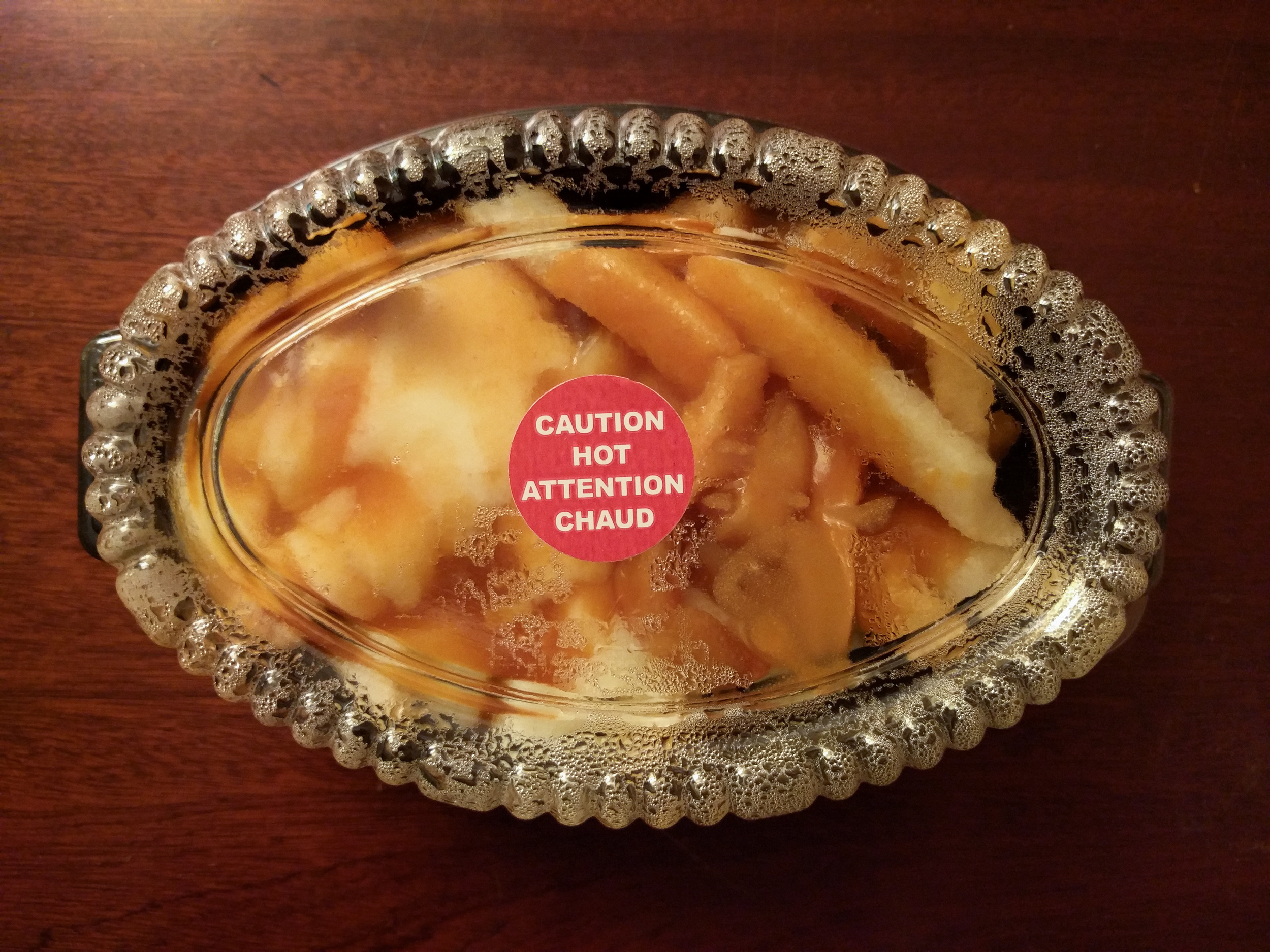The packaging is certainly more attractive (but less environmentally friendly). And there's no marketing nonsense -- just a simple lawsuit-prevention sticker.