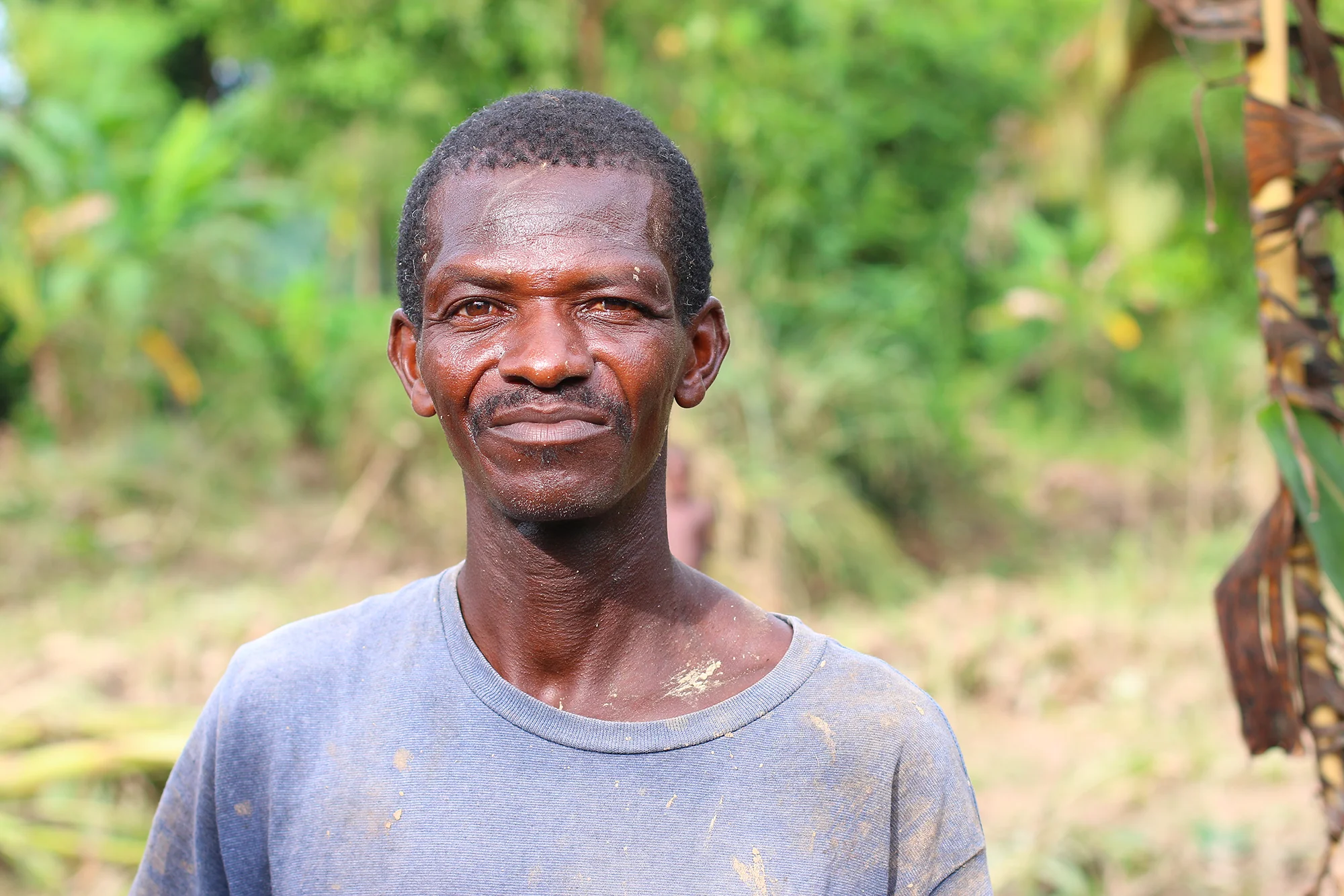 Osa Jonmaritus stands in front of his home in Lachapelle, Haiti, just hours after Hurricane Irma brought flash flooding to his community and washed he and his family out of their home in the night. Osa, a community health organizer shared with the MCC assessment team that he is worried that cholera, which had already been on the rise in the region before the hurricane, will be exacerbated by the recent floods. Photo/Annalee Giesbrecht