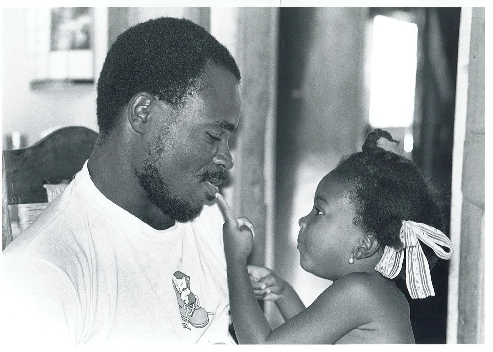 Jean Remy Azor with his daughter Jeanida in 1994. 