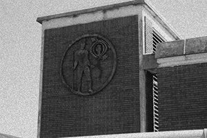 Bienville's disc tattoo is seen in Julian Rayford's 1974 sculpture which hangs on the entrance to the George Wallace tunnel