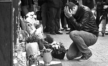 Mourners after the Paris attacks