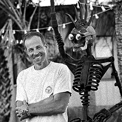 The artist Bruce Larsen with one of his pieces