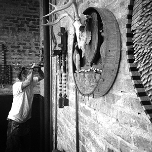 The artist Chris Cumbie putting together a show at Spire