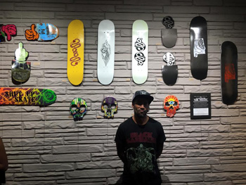 Jewel Cullen, the artist behind the recent Skateboard Art Show to benefit the Flow Intitutive at Serpents of Bienville