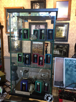 Photo of the inside of the new Serpents of Bienville Space, artwork by Chris Cumbie available in the space.