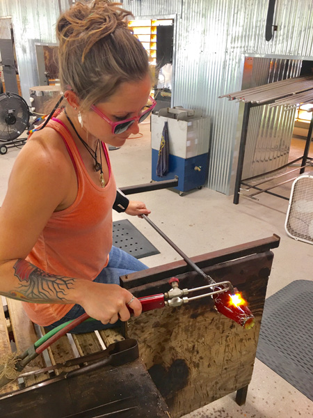 Kerry Parks at work at the Hot Shop of the Coastal Arts Center