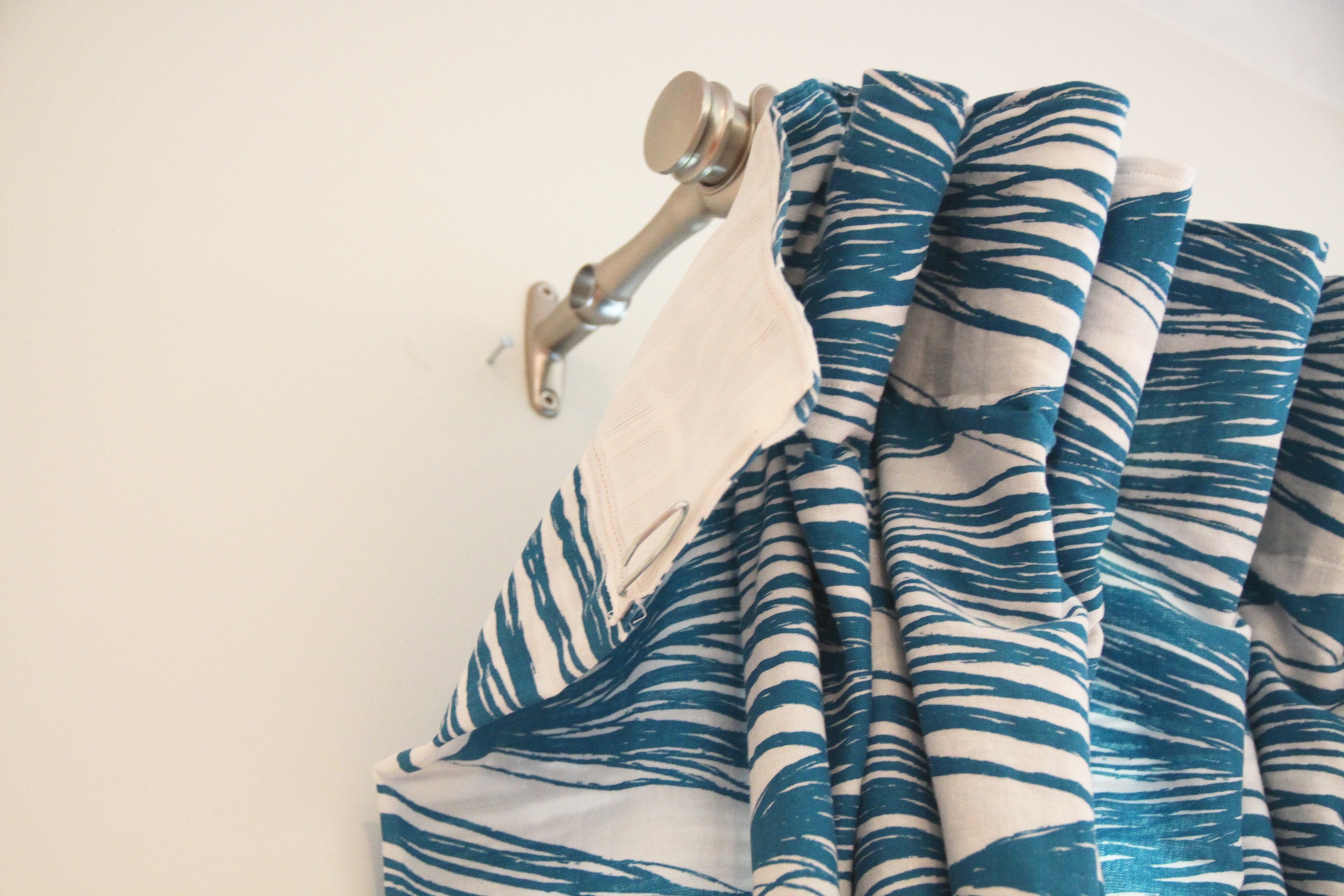 DIY Pinch-Pleat Curtains Return to the Wall