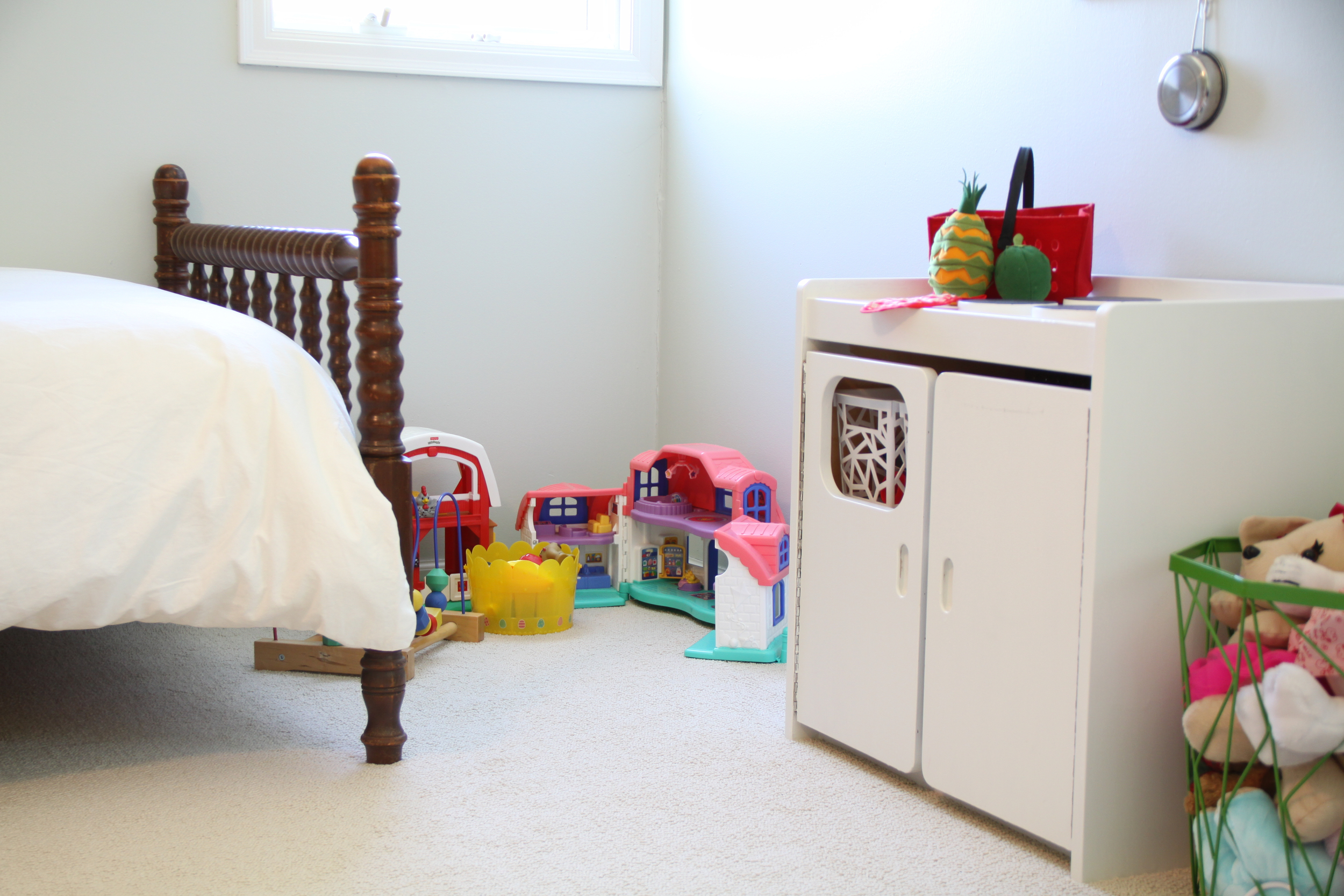 Girl's Room with White Walls and Play Kitchen