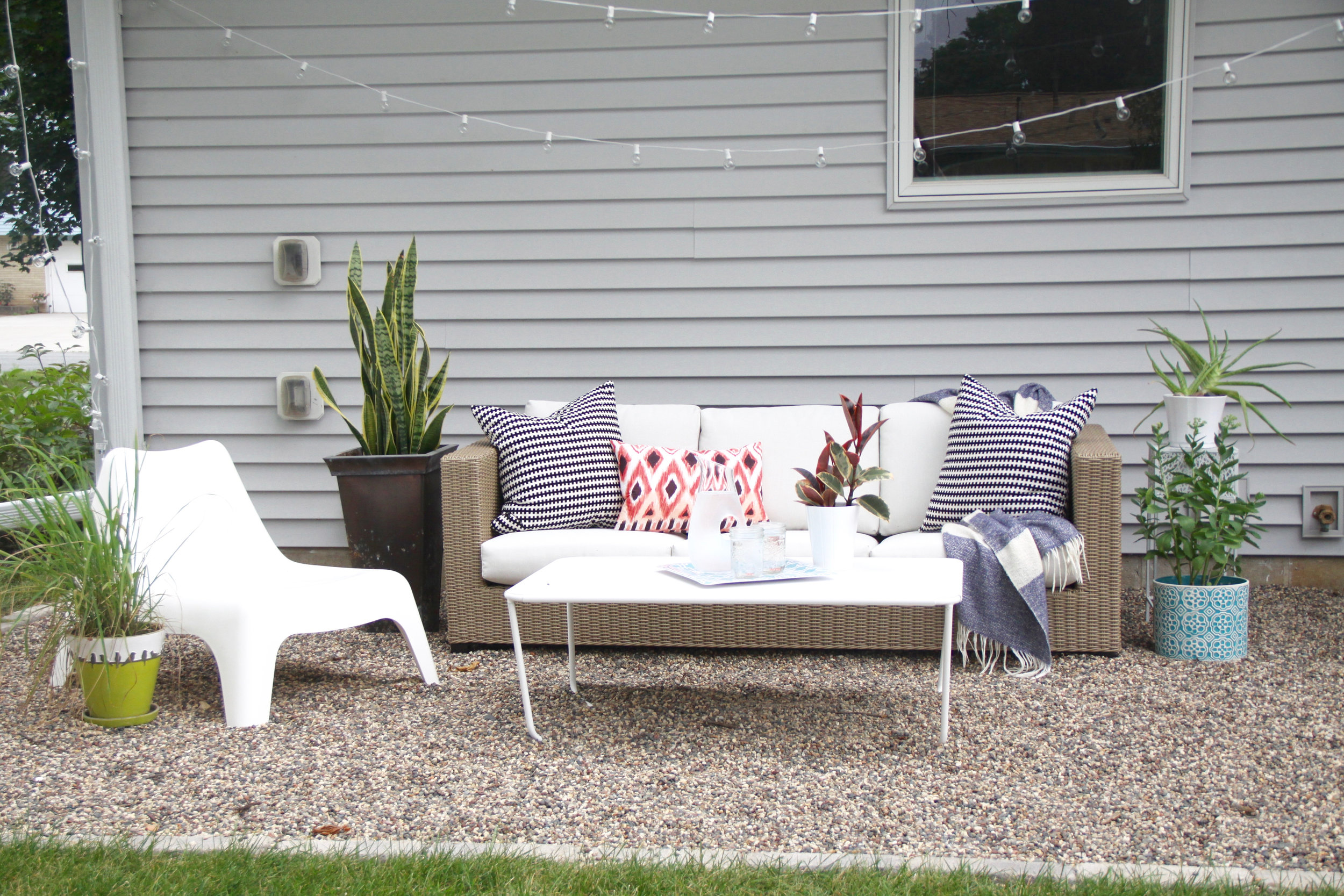 DIY Pea Gravel Patio with Outdoor Sofa