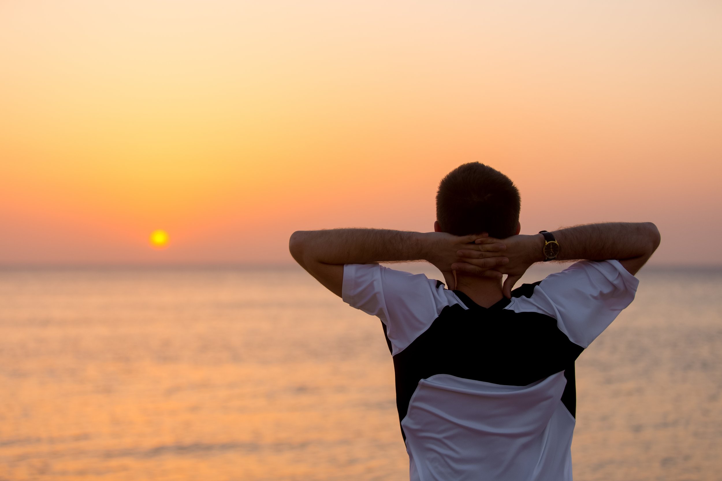 photos of person enjoying the sunrise