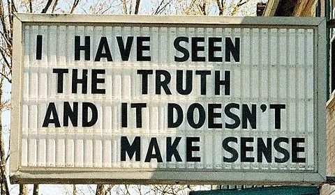sign saying "I have seen the truth and it doesn't make sense"