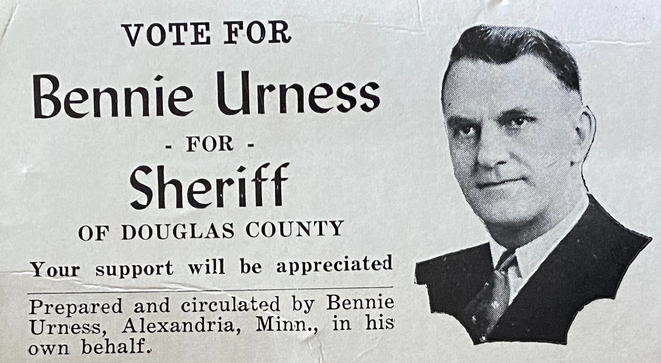 Black and white campaign flyer for Benny Urness, running for sheriff of Douglas County, featuring a portrait photograph of Benny Urness wearing a suit and tie.