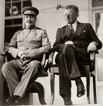 Fred Koch (right) made much of the money he passed on to his sons selling oil refining technology and equipment to both Hitler and Stalin (left)