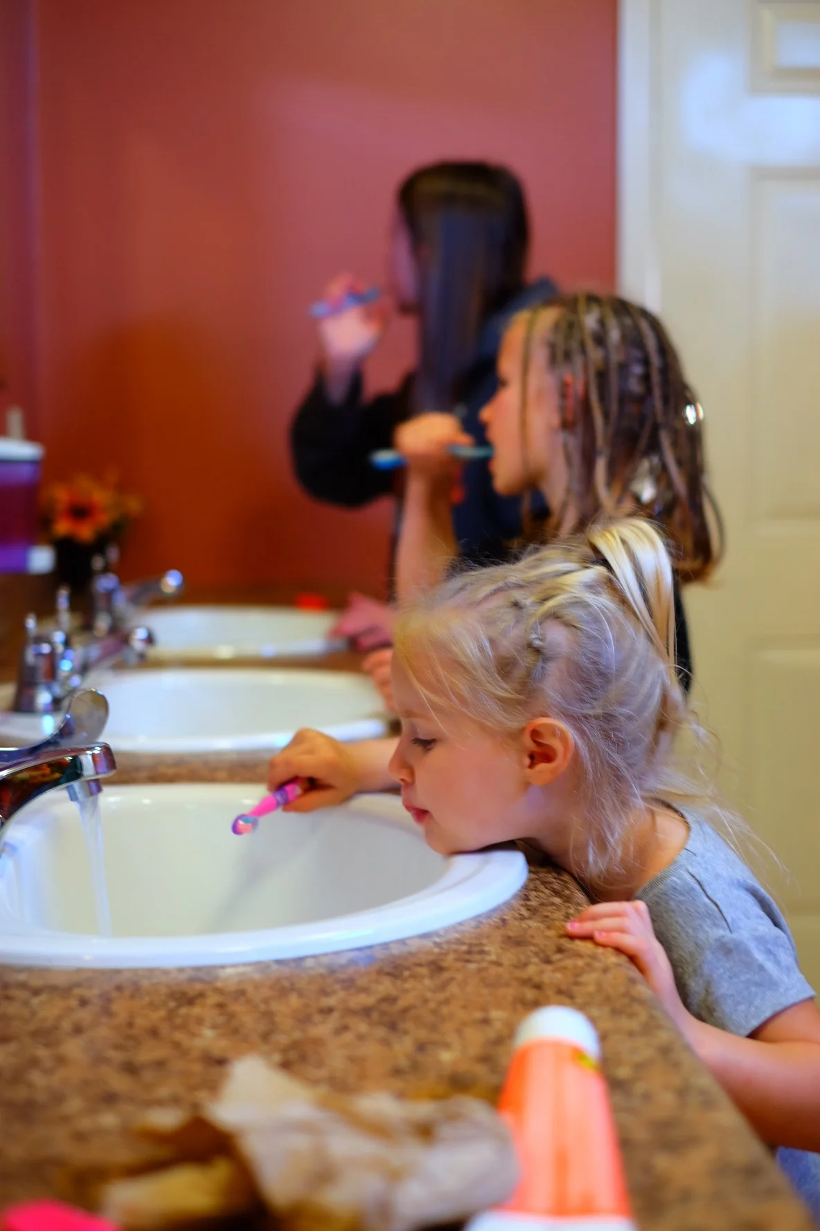 Group brushing in the community bathroom because we didn't hook up the water in our camper since we were only saying over night.