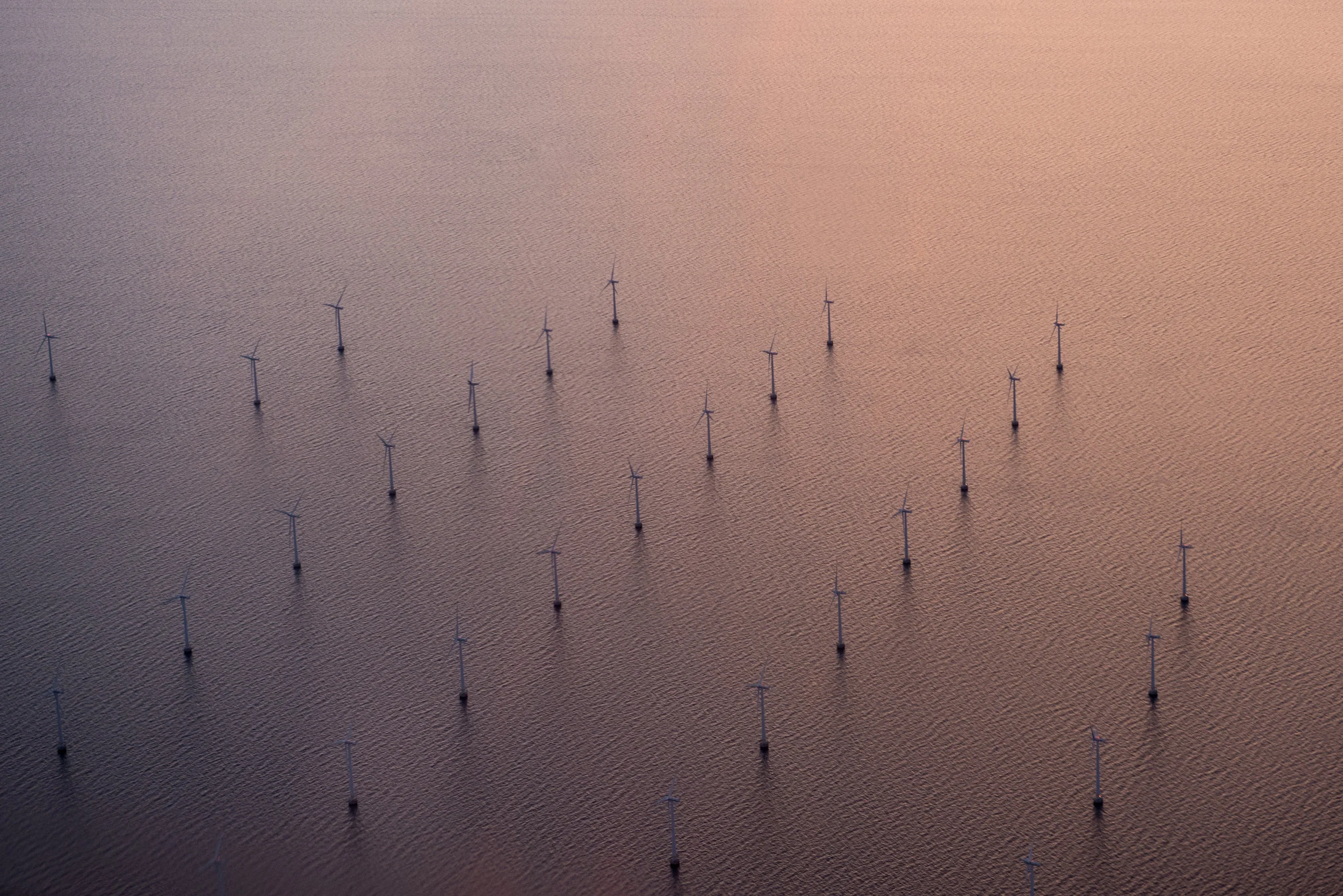 Aerial View of Offshore Windmill Farm at Sunset