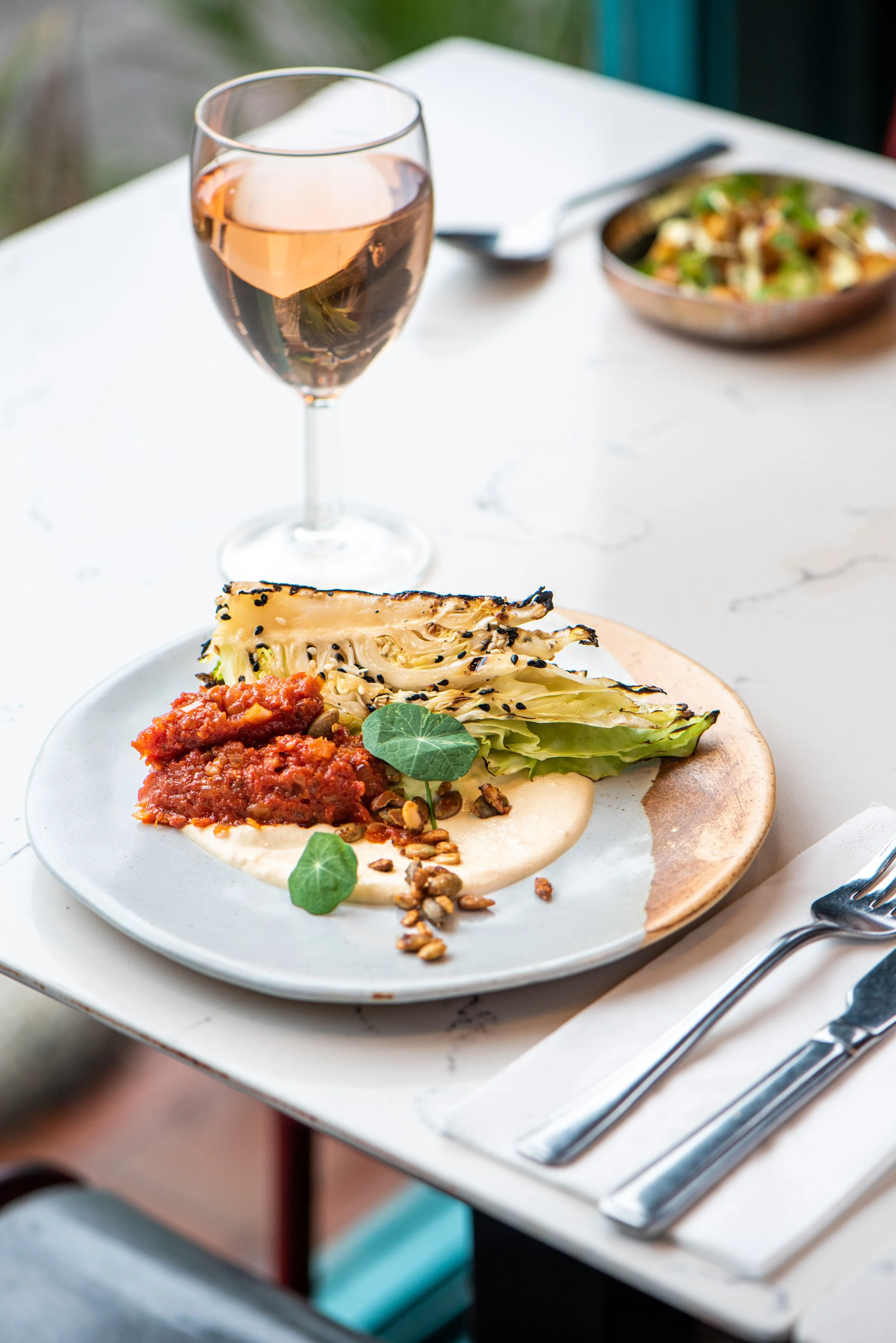 Charred Hispi Cabbage With Cashew Ricotta & Harissa 