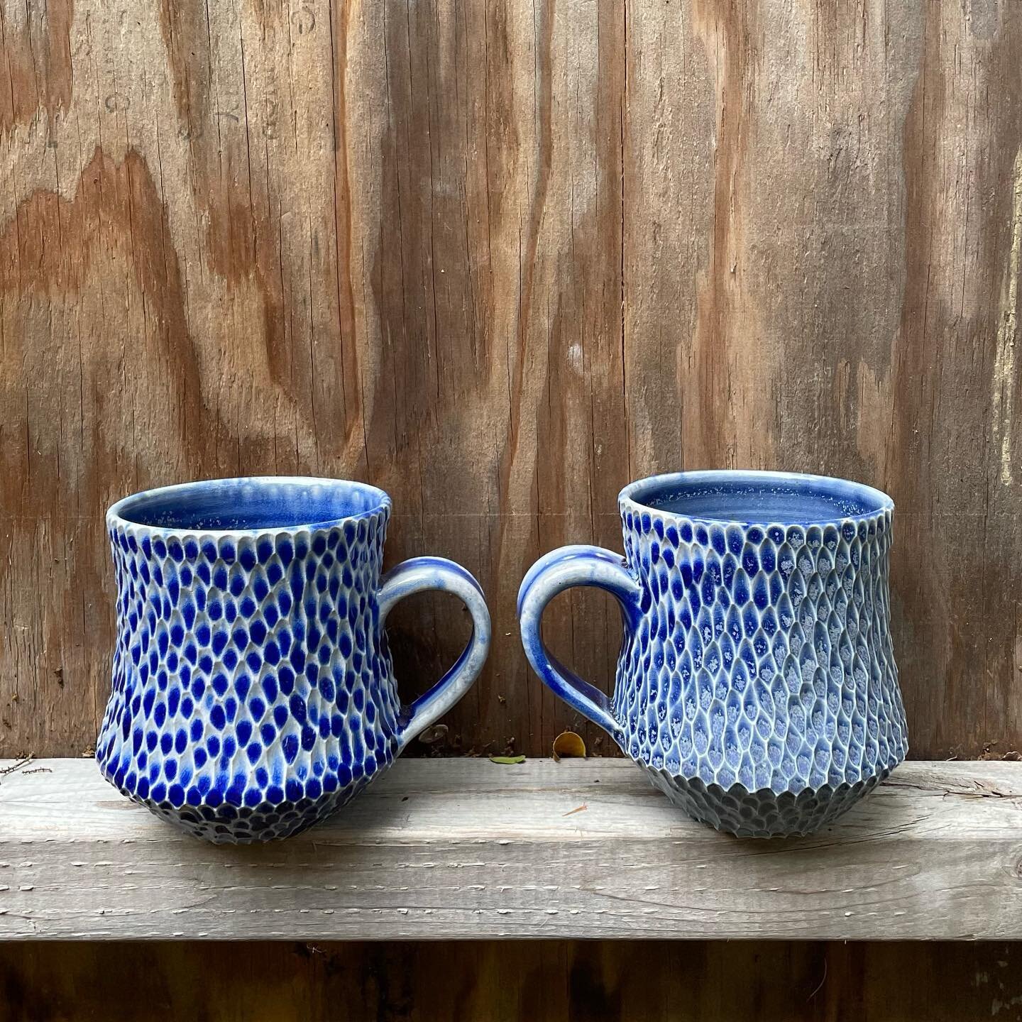 Shinny blue mugs fresh off the kiln shelf and heading to @clovermarket Chestnut Hill this Sunday, September 11th!! #clovermarketsneakpeek #handmade #pottery #womenwhowoodfire